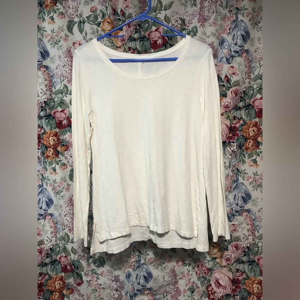 Plain white long sleeve, missing yak but fits like medium